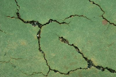 How Surface Cracks Impact Tennis Court Playability