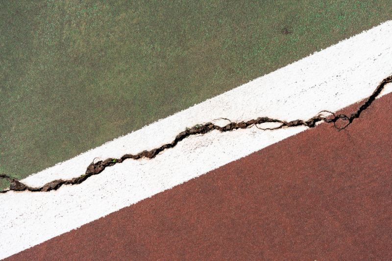 How Surface Cracks Impact Tennis Court Playability